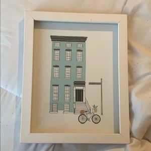 Cute building and bike frame
